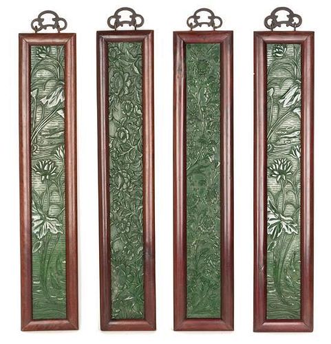 A Set of Four Chinese Jade Plaques Height 24 1/4 x width 3 1/2 inches.