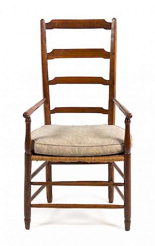 * An American Ladder Back Armchair Height 41 inches.