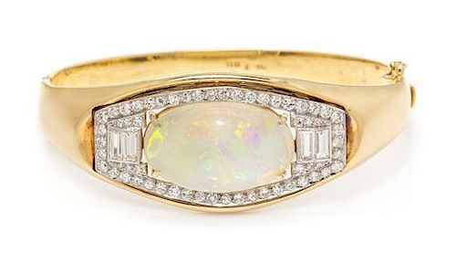 An 18 Karat Yellow Gold, Opal and Diamond Bangle Bracelet, 35.50 dwts.