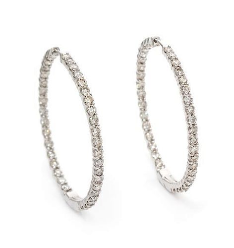 A Pair of White Gold and Diamond Hoop Earrings, 5.70 dwts.