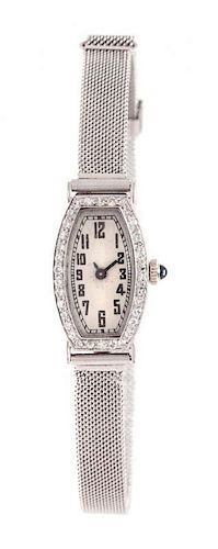 An Art Deco Platinum and Diamond Wristwatch, 13.60 dwts.