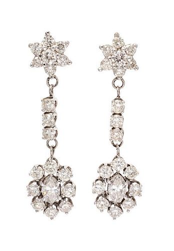 * A Pair of White Gold and Diamond Dangle Earrings, 3.40 dwts.