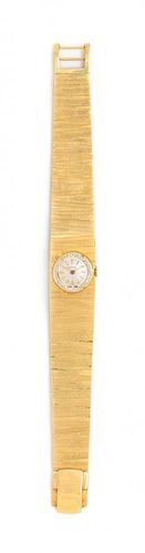 A Vintage 18 Karat Yellow Gold Wristwatch, 40.30 dwts.
