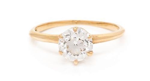 * A 14 Karat Yellow Gold and Diamond Solitaire Ring, 1.00 dwts.