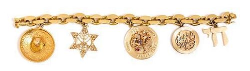 * An 18 Karat Yellow Gold Bracelet with Five Attached Charms, 36.50 dwts.