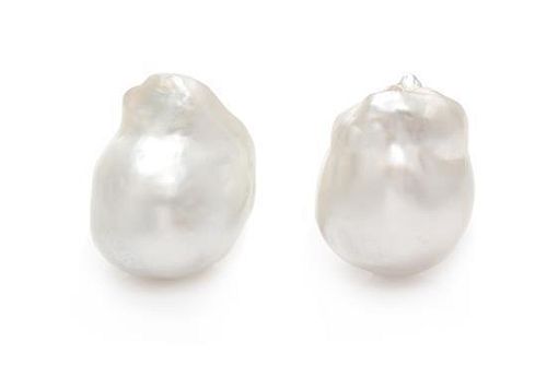 * A Pair of 18 Karat White Gold and Cultured Baroque Pearl Earclips, 9.10 dwts.