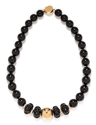 A 14 Karat Yellow Gold and Onyx Bead Necklace, 67.10 dwts.