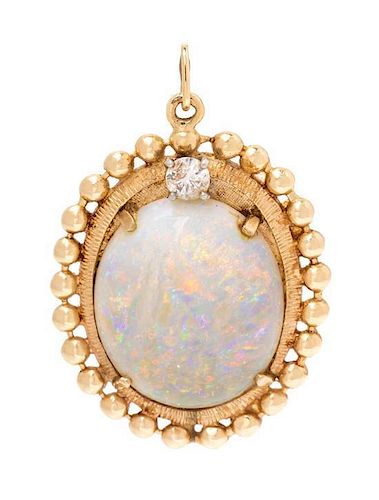 A 14 Karat Yellow Gold, Opal and Diamond Pendant, 6.70 dwts