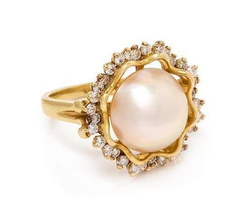 An 18 Karat Yellow Gold, Cultured Mabe Pearl and Diamond Ring, 5.50 dwts.