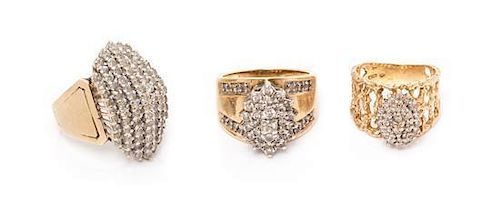 * A Collection of 10 Karat Yellow Gold and Diamond Rings, 12.70 dwts.
