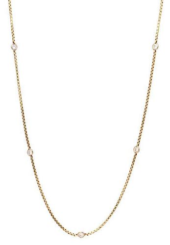 A 14 Karat Yellow Gold and Diamond Station Necklace, 5.80 dwts.