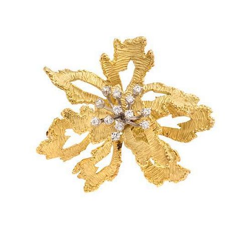 * An 18 Karat Bicolor Gold and Diamond Floral Motif Brooch, 14.20 dwts.
