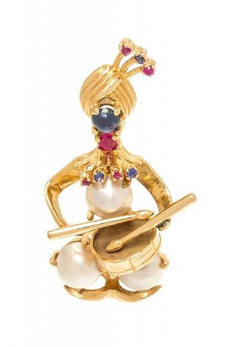 A 14 Karat Yellow Gold, Sapphire, Ruby and Cultured Mabe Pearl Genie Playing the Drums Brooch, 7.90 dwts.