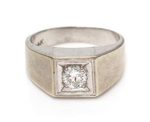 * A 14 Karat White Gold and Diamond Ring, 3.65 dwts.