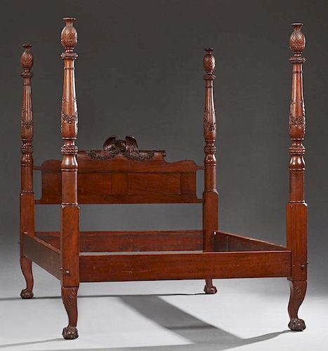 American Federal Revival Carved Mahogany Four Poster Bed, late 19th c., the pineapple and leaf carved posts terminating in ca