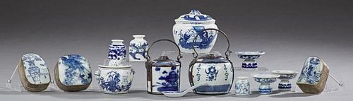 Group of Fourteen Pieces of Chinese Blue and White Porcelain, late 19th c., consisting of four covered jars, a spoon rest, th