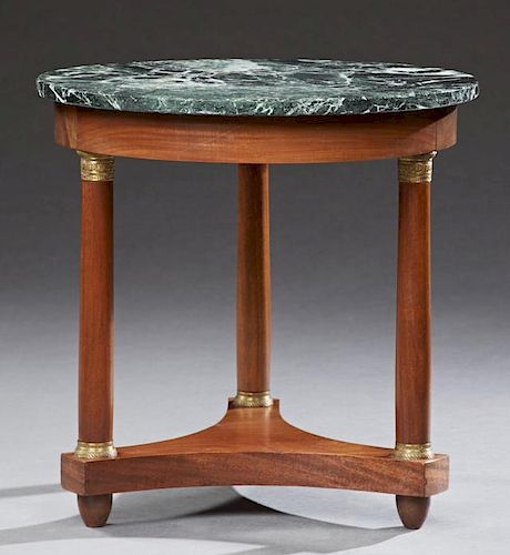French Empire Style Ormolu Mounted Carved Mahogany Marble Top Lamp Table, 20th c., the circular verde antico marble over a wi