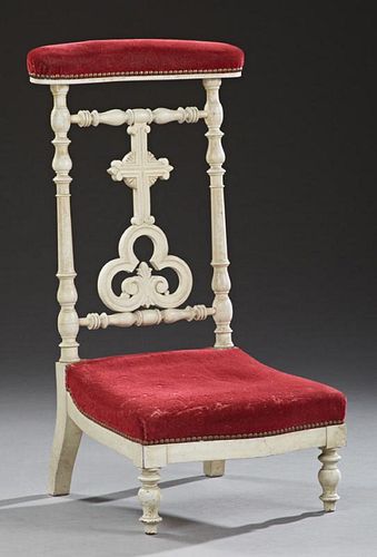French Polychromed Beech Prie Dieu, c. 1870, the upholstered arm rest over a cross back splat, above a pierced trefoil, to a 