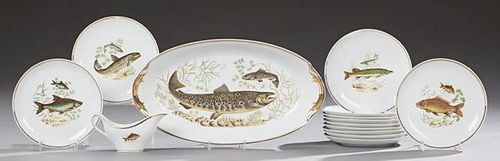 French Fourteen Piece Porcelain Fish Set, 20th c., by Porcelaire d'Aquitaine, consisting of twelve plates, an oval platter an