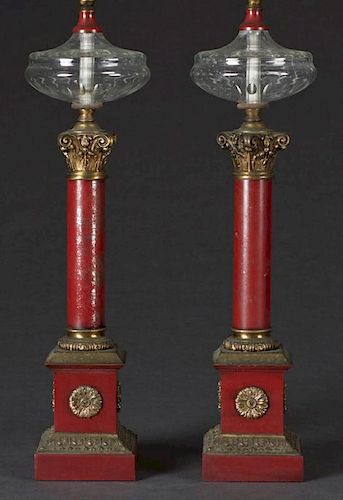 Pair of Decorative Gilt, Spelter and Porcelain Oil Style Table Lamps, 20th c., with glass fonts on gilt decorated magenta por