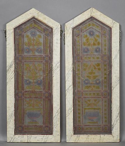 Pair of Painted and Fired Glass Windows, 19th c., of peaked form, with floral decoration, presented in faux marble frames, H.