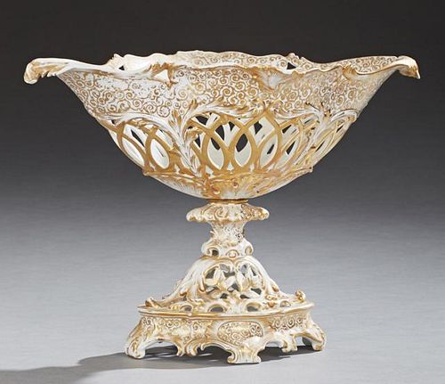 Old Paris Porcelain Oval Center Bowl, 19th c., with elaborate gilt decoration over pierced sides on a socle supports to a pie