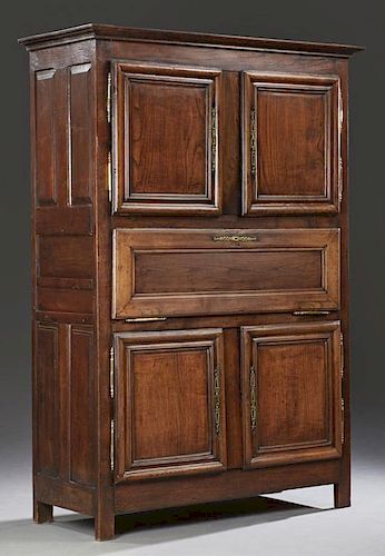 Unusual French Provincial Carved Oak Sideboard, 19th c., the stepped ogee crown over double cupboard doors with brass escutch