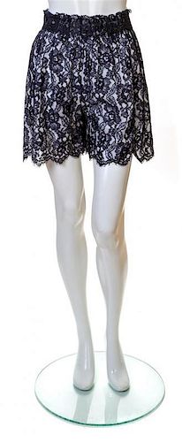 A Pair of Chanel Navy Lace Shorts, Size 36.