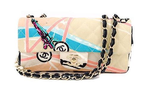 A Chanel Eiffel Tower Print Quilted Flap Bag, 9" x 5" x 2.5"; Strap drop: 16".