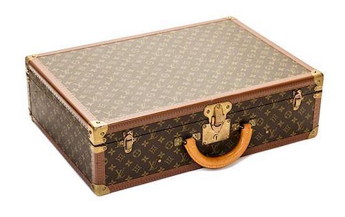 A Louis Vuitton Monogram Canvas Bisten 60 Suitcase, 23.6" x 16.5" x 7.1".