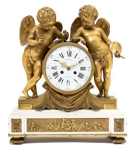 A Louis XV Style Gilt Bronze and White Marble Clock Height 17 1/2 x width 14 3/4 x depth 5 1/2 inches.