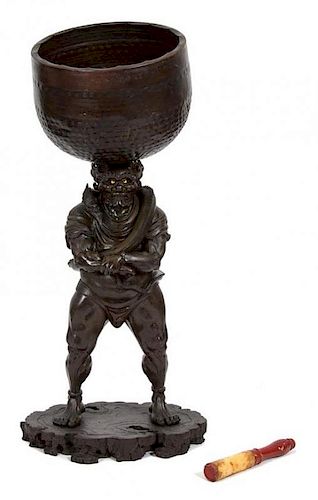 A Japanese Bronze Oni Holding a Drum Height 46 inches.
