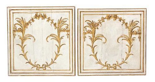 A Pair of French Rococo Style Painted and Giltwood Boiserie Panels Height 31 1/2 x width 33 inches.