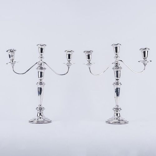 Pair Empire Weighted Sterling 3 Arm Candelabra. Signed. Minor bends, dings. Measure 13-1/2" H. Ship
