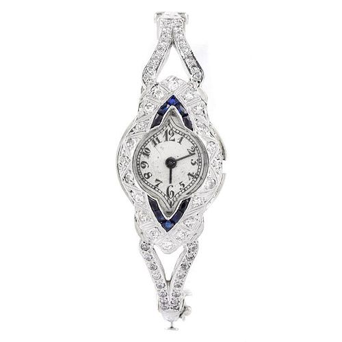 Art Deco Diamond, Sapphire and Platinum Bangle Bracelet Watch. Unsigned. Watch needs stem put back