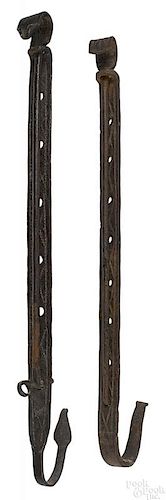 Two wrought iron trammels