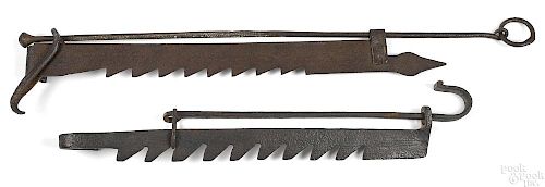 Two wrought iron sawtooth trammels
