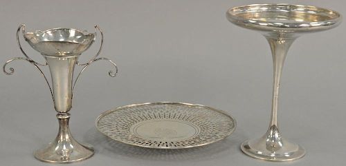 Three piece sterling silver lot including a compote (ht. 9in.), vase (ht. 7 1/2in.), and plate (dia. 9 1/2 in.). 25.6 total t