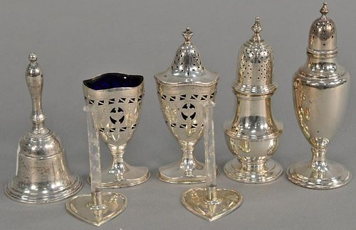 Seven piece sterling silver lot including containers with cobalt liners (one with cover), a pepper, a bell, a castor, two sma
