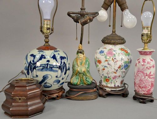 Five piece lot to include four Chinese table lamps: blue and white ginger jar (ht. 8in.), green and yellow glazed figure, sma