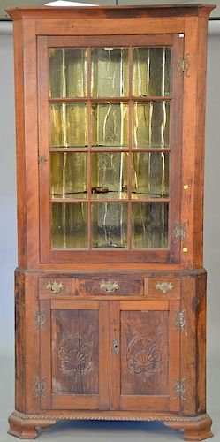 Custom corner cabinet in two parts. ht. 88 in., wd. 40 in., dp. 19 in.  Provenance: From the Estate of Faith K. Tiberio of Sh
