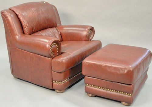 Leather easy chair and ottoman.