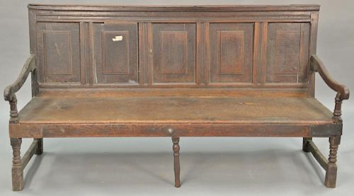 Jacobean oak bench with paneled back, late 17th to early 18th century. ht. 37 in., wd. 72 in.
