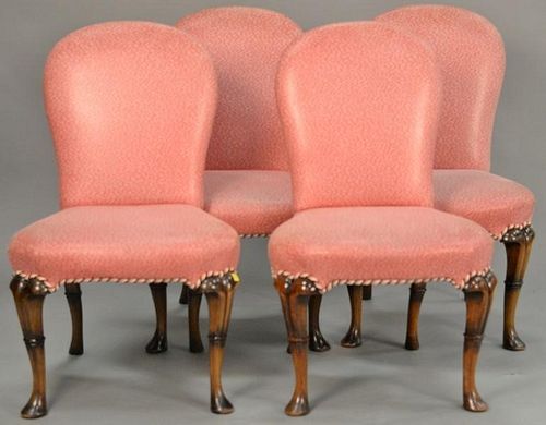 Set of four custom upholstered Queen Anne style side chairs.