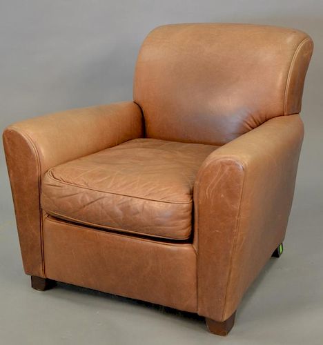 Pottery barn brown leather easy chair (sun faded).