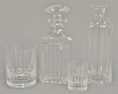 Baccarat crystal decanter set to include a bottle with stopper, set of eight goblets, eight cordials, two large goblets, and 