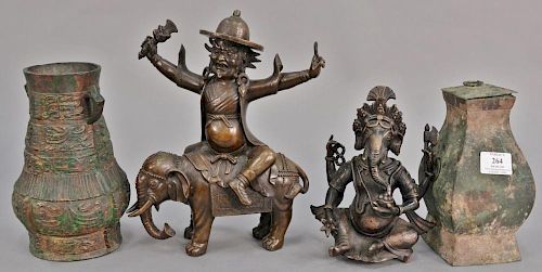 Group of four bronzes to include a warrior on an elephant, a mythical elephant, and two archaic urns. ht. 8in. to 12in.