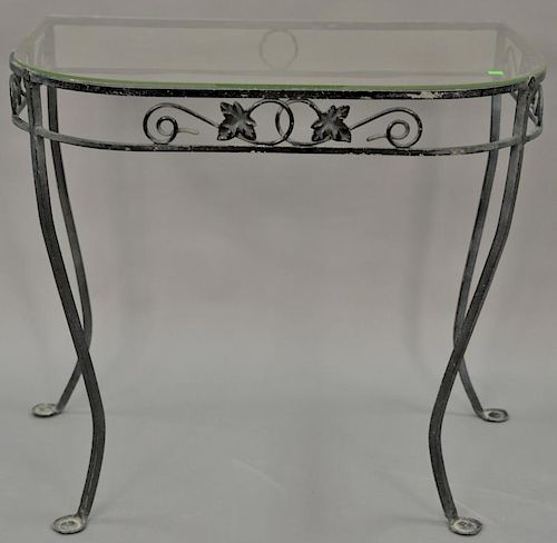 Glass top iron table and electric trash can. ht. 29 in., top: 24" x 32"