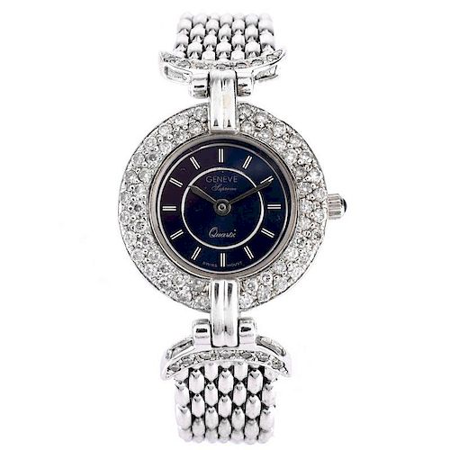 Lady's Vintage Geneve Supreme Diamond and 14 Karat White Gold Bracelet Watch with Quartz Movement.