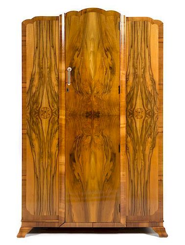 Art Deco, c.1930, a bedroom suite, comprising and armoire, cabinet and vanity/desk